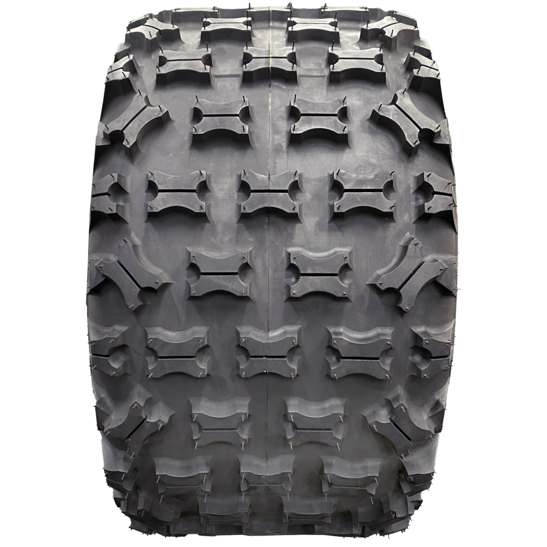 Full frontal view of Ground Buster 3 ATV tire, highlighting its non-directional, sipped X-knob tread pattern. This design promotes better flex and offers riders the edge they need in competitive racing across intermediate to hard terrains.