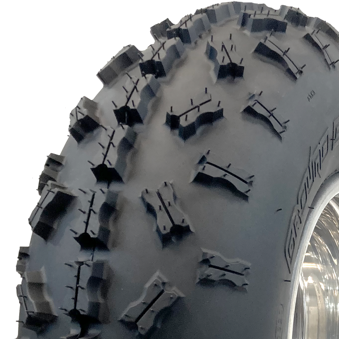 A close-up view of the  non-directional sipped X-knob tread