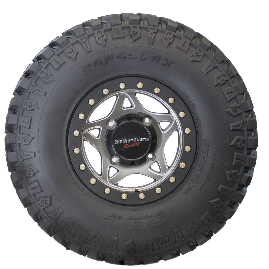 Side view of the Parallax UTV tire, showcasing broad shoulder blocks that ensure maximum traction and continuous ground contact for enhanced stability. The image also features an extended sidewall lug design for increased cornering traction and protection against sidewall punctures and other potential damage.