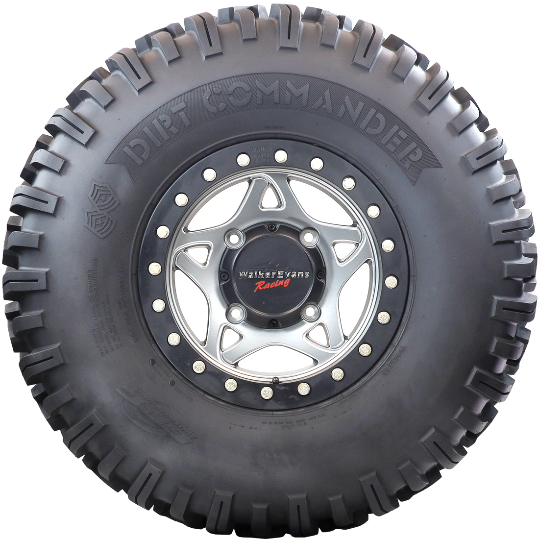 Close-up view of the Dirt Commander tire sidewall, emphasizing its tough sidewall lugs and sturdy construction, purpose-built for SXS/UTV off-road vehicles