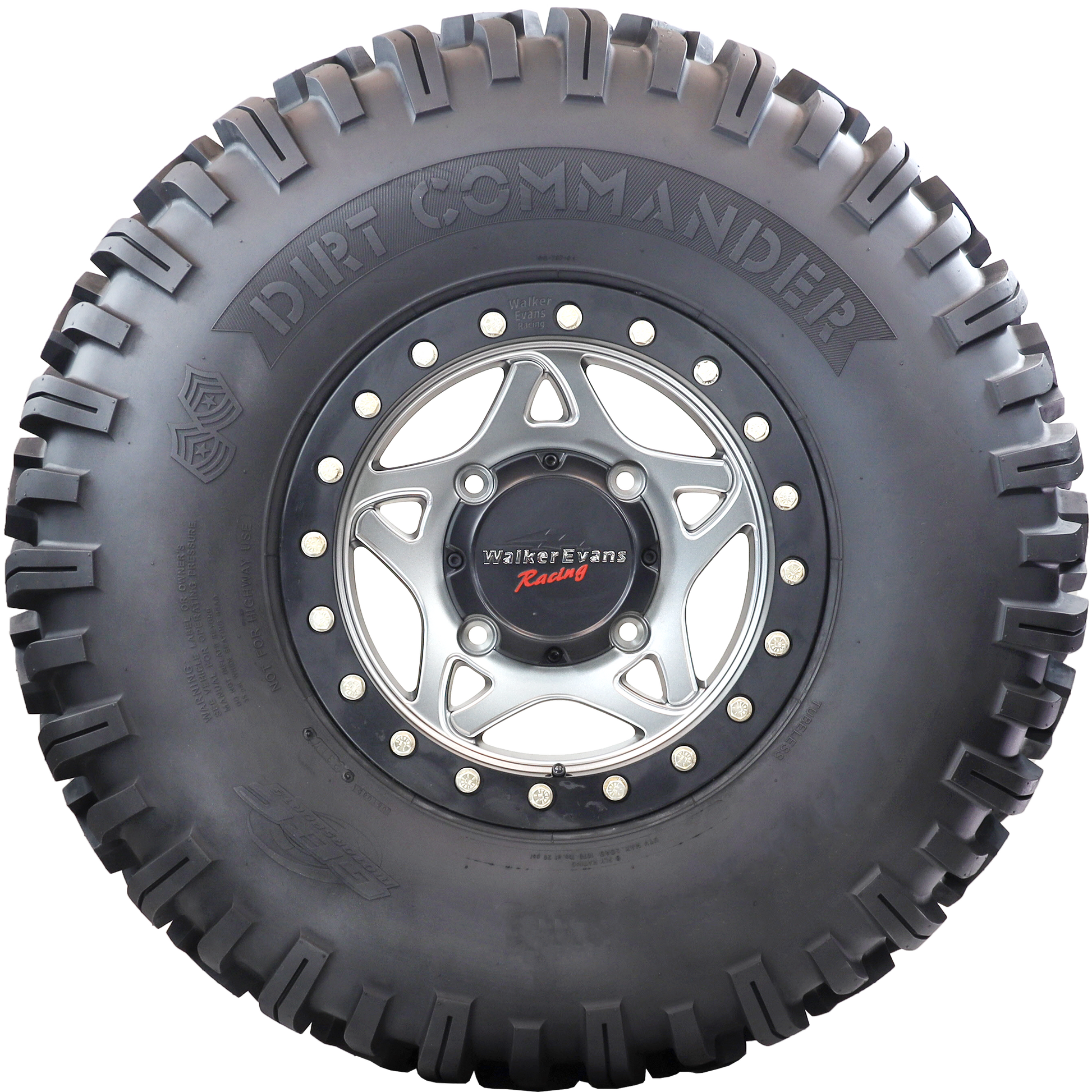 Close-up view of the Dirt Commander tire sidewall, emphasizing its tough sidewall lugs and sturdy construction, purpose-built for SXS/UTV off-road vehicles
