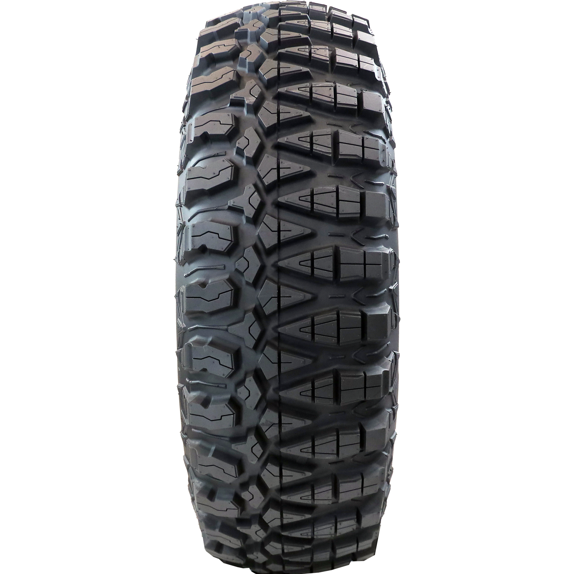 Full frontal view of Terra Master ATV/UTV tire, displaying its unique two distinct tread patterns. The user can alternate sides for improved traction in either hard or soft-to-intermediate terrains, offering versatile performance for diverse off-road experiences.