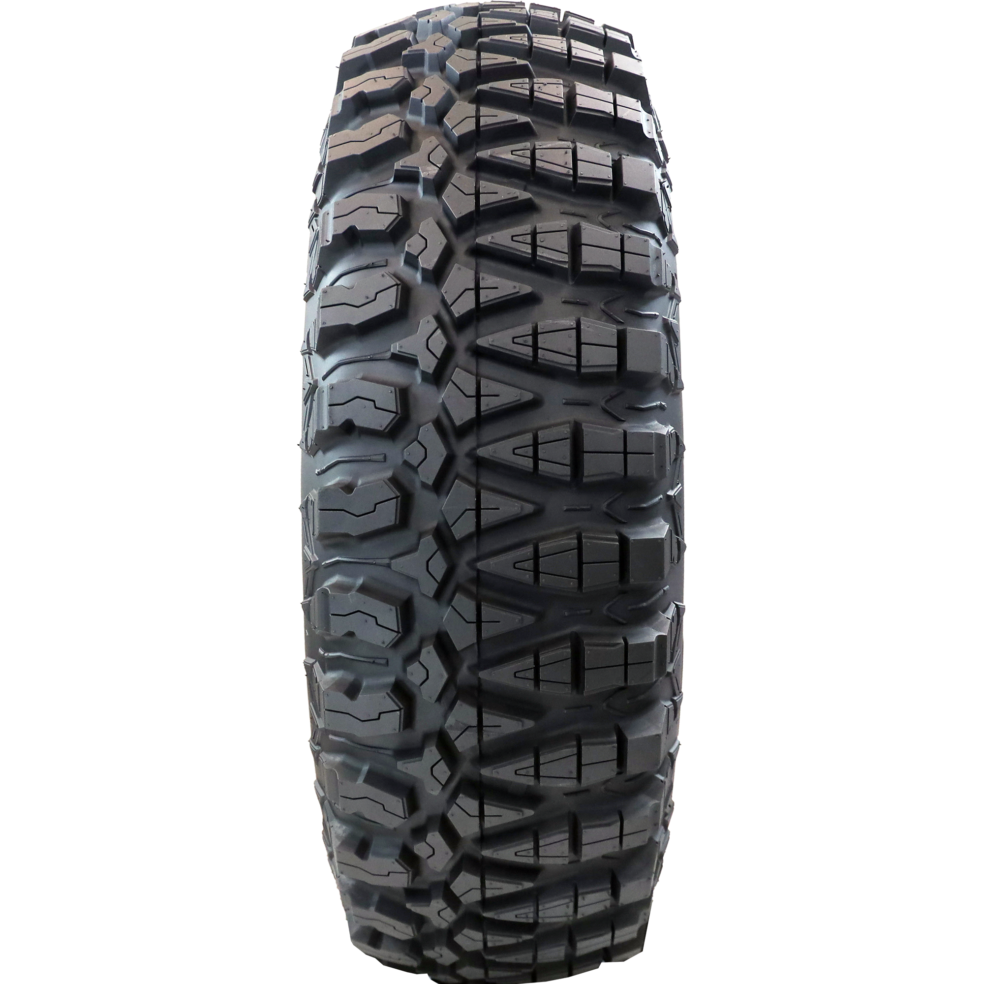 Full frontal view of Terra Master ATV/UTV tire, displaying its unique two distinct tread patterns. The user can alternate sides for improved traction in either hard or soft-to-intermediate terrains, offering versatile performance for diverse off-road experiences.