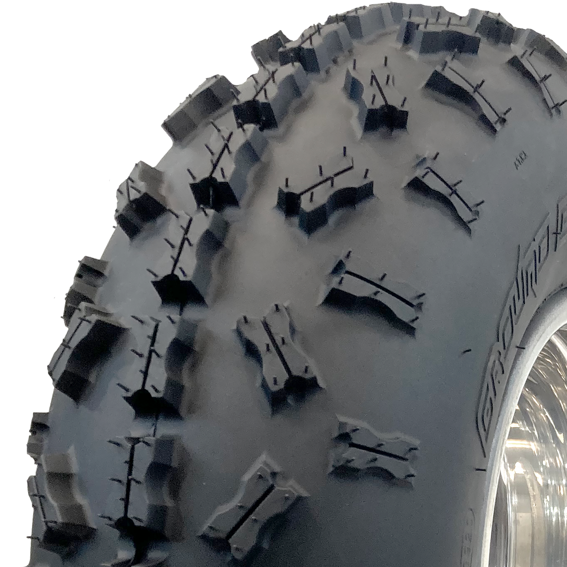 A close-up view of the  non-directional sipped X-knob tread 