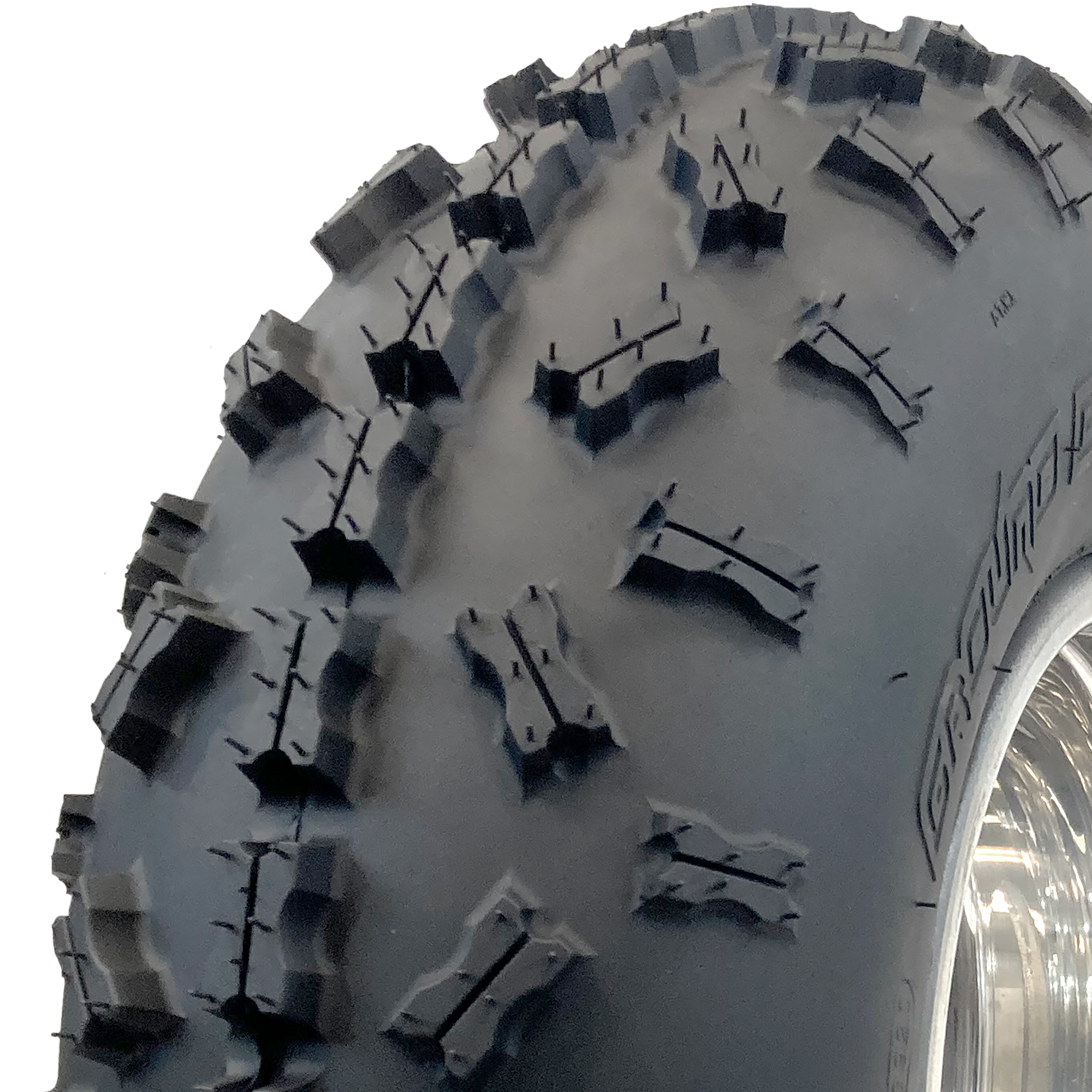 A close-up view of the  non-directional sipped X-knob tread 